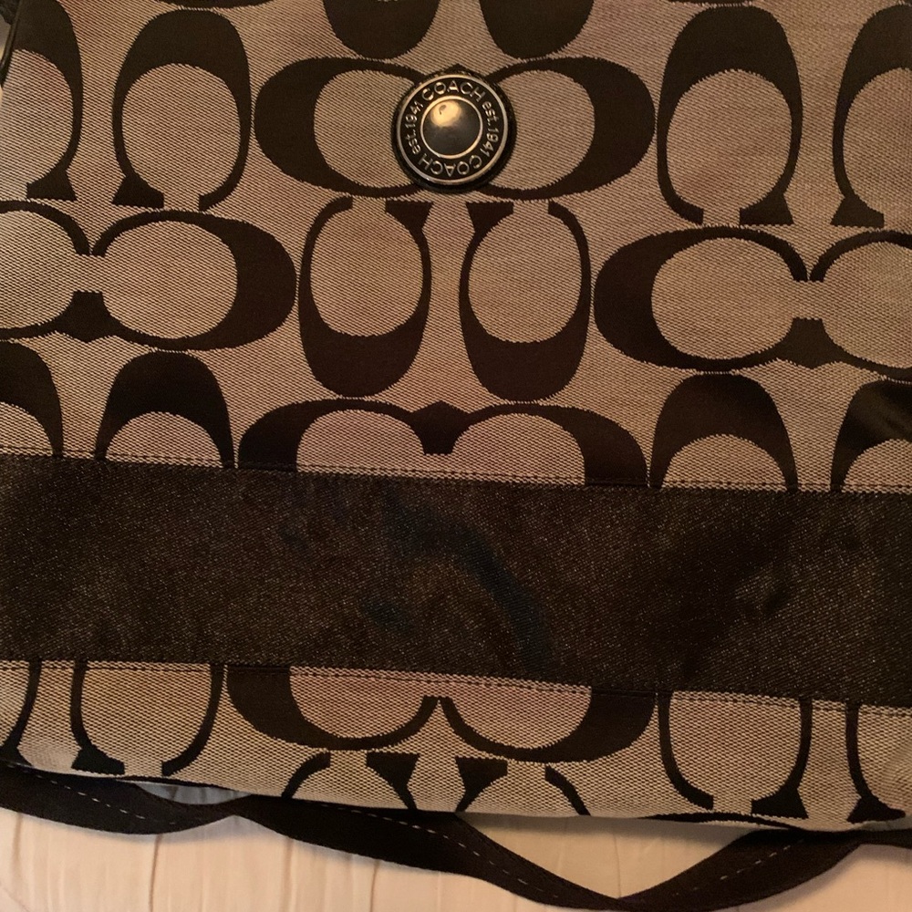 Black and white cross body coach bag